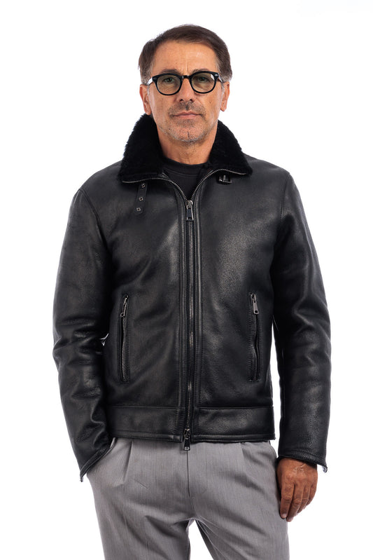 Bomber interamente in montone con zip nero pelo nero