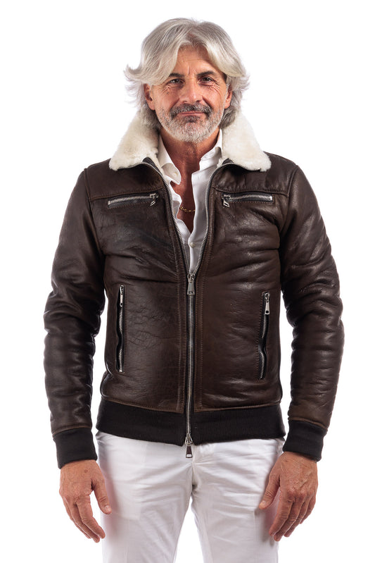 Bomber interamente in montone marrone pelo bianco con zip