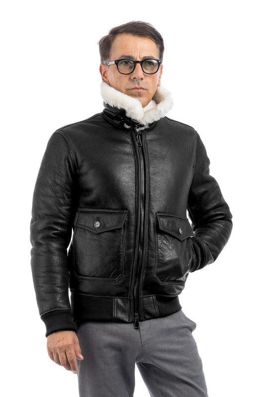 Bomber interamente in montone nero pelo bianco con zip VAST