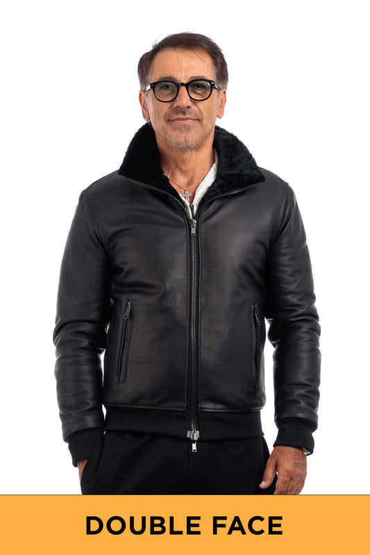 Bomber interamente in montone rovesciato nero con zip double face